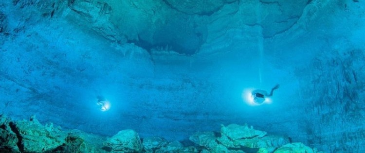A photo dated May 13, 2012 and published on May 15, 2014 by the National Institute of Anthropology and History of an exploration of the Hoyo Negro Underwater Cave, Mexico. INAH/AFP/Archives - ROBERTO CHAVEZ ARCE